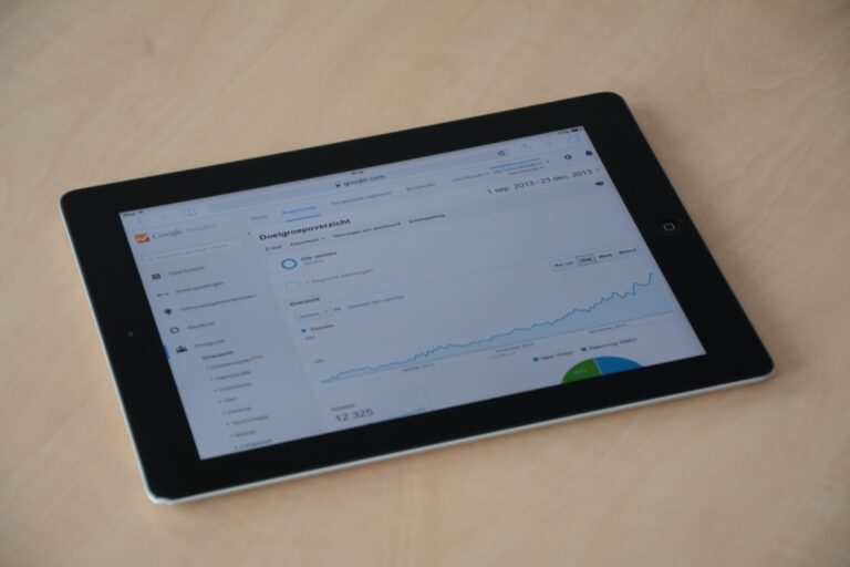Close-up of a digital tablet showing data on screen