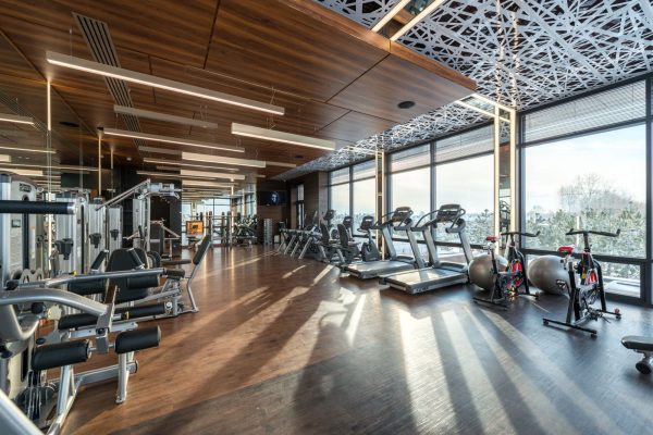 Gym floor with exercise bikes and training equipment