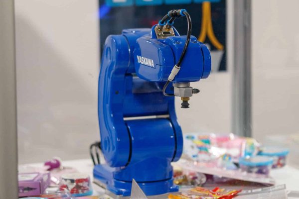 Industrial robot arm on a manufacturing line